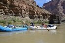 Raft floating past Vulcan's Anvil in the Grand Canyon