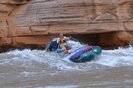Whitewater raft running Upset Rapid on the Colorado River
