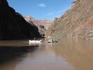 Raft floating down the Colorado River above Hermit Rapid