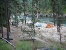 Looking through the trees at tents pitched at Upper Yellow Pine Camp