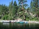 Rafts along the shore at the Whitie Cox Camp on the Middle Fork of the Salmon