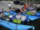 A raft carrying a bag of garbage