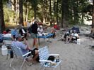 A nice sandy river campsite at the edge of the trees