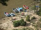 Five colorful rafts at Harding 1 Camp viewed from high above