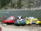 Three colorful rafts on a beach on the Main Salmon, Idaho