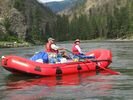 Bright red raft on the Main Salmon, Idaho