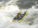 Raft making a run through the whitewater of Dagger Falls on the Middle Fork of the Salmon River