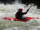 A red kayak in whitewater on the Lochsa River, Idaho