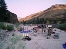 A river rafting party camped on a beach