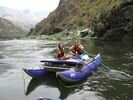 A couple on a purple cat a raft on the Lower Salmon, Idaho