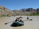 A green raft coming at the camera in Desolation Canyon, Utah
