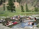 A group soaking in Whitey Cox Hotspring, on the Middle Fork of the Salmon, Idaho