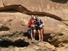 Two gals standing in front of pictographs