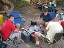 A group playing poker on a makeshift poker table