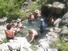 People enjoying Barth Hot Springs on the Main Salmon River, Idaho