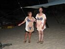 A man and a woman wearing tee shirts, each with a different bikini body design
